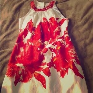 White with red floral dress